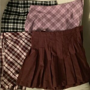 4 - girls skirts size 10-12.
